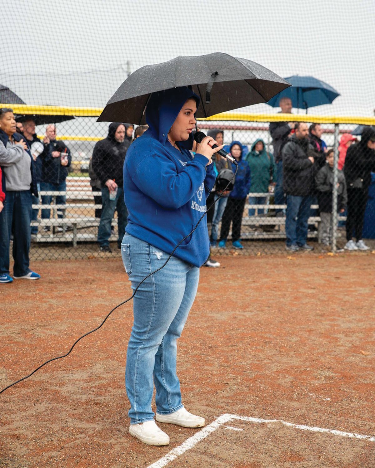 ON THE MIC: Lindsay Iadeluca sings the National Anthem.